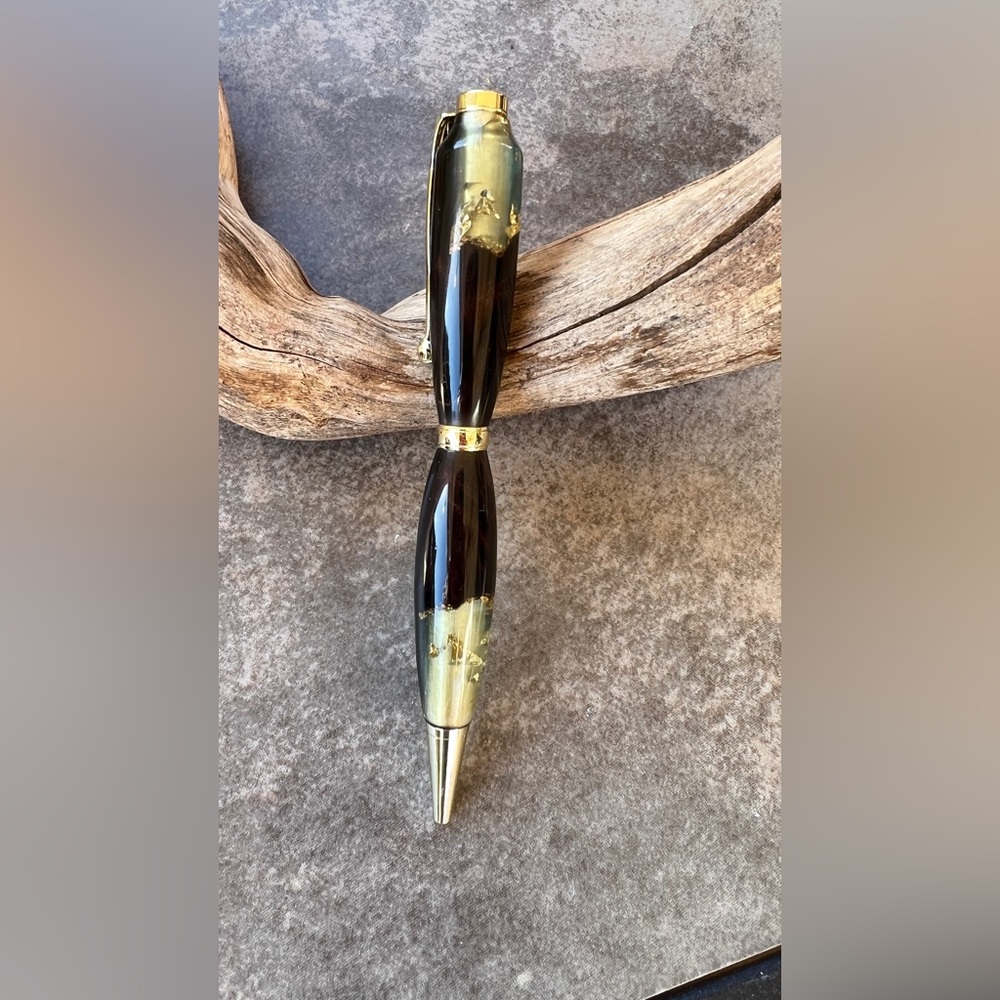 Acrylic hand turned pen. Slimline style ball point black ink.